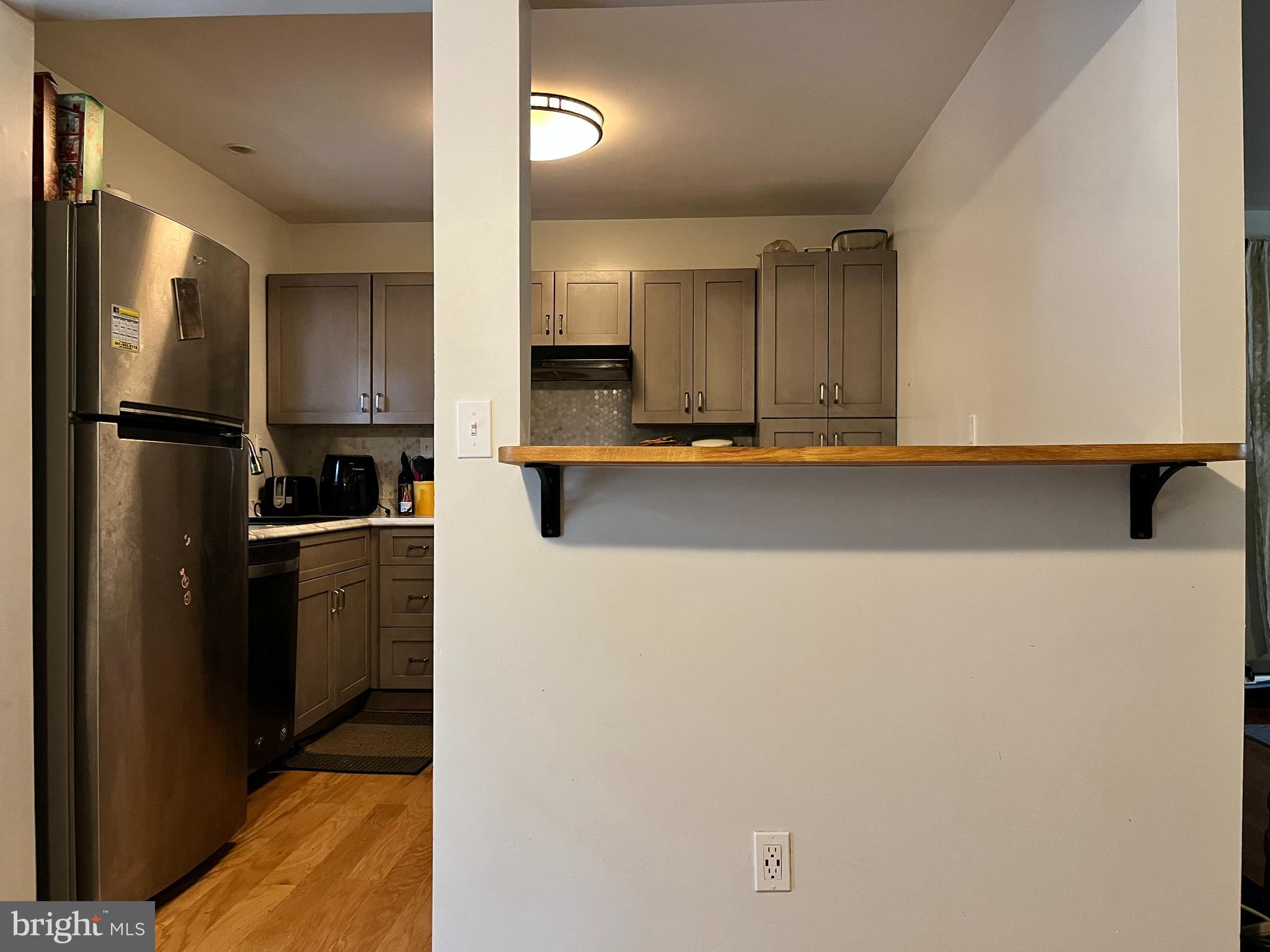 6011 Ladd Road Suitland, MD 20746 - Photo 20 of 33 Kitchen opening ledge (seats 2)