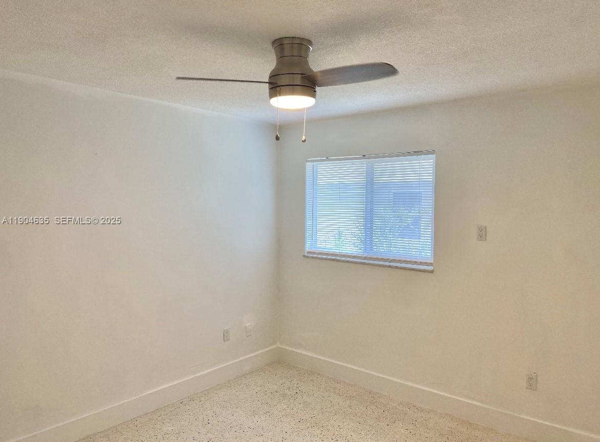 1012 Southwest 4th Avenue, Unit 3 Miami, FL 33130 - Photo 11 of 16 an empty room with a window