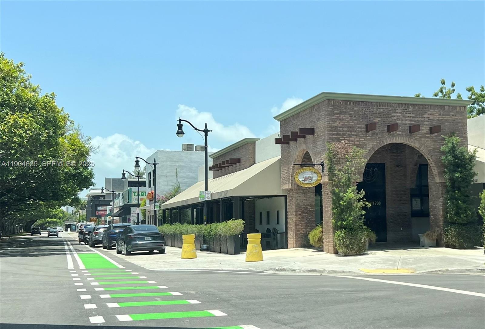 1012 Southwest 4th Avenue, Unit 3 Miami, FL 33130 - Photo 9 of 16 a view of a building with a garden and pathway