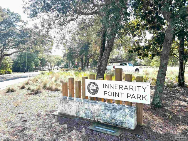 a sign on the side of the road