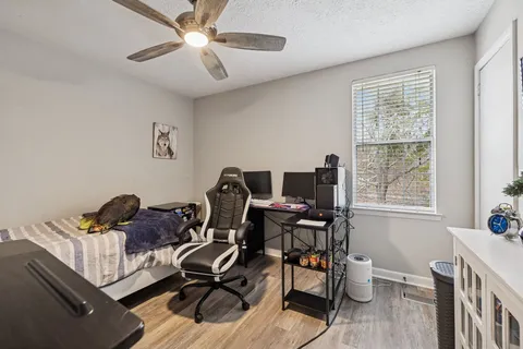 a work room with furniture and windows