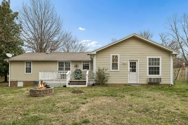 a front view of a house with yard