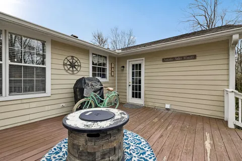 a backyard of a house with seating space