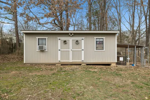 a house with yard in front of it