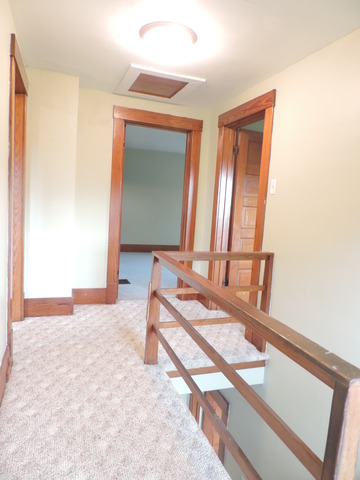 11525 South Dwight Road Dwight, IL 60420 - Photo 14 of 21 a view of a bedroom with wooden floor and a bathroom