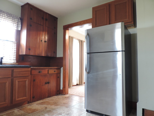 11525 South Dwight Road Dwight, IL 60420 - Photo 8 of 21 a white refrigerator freezer sitting in a kitchen