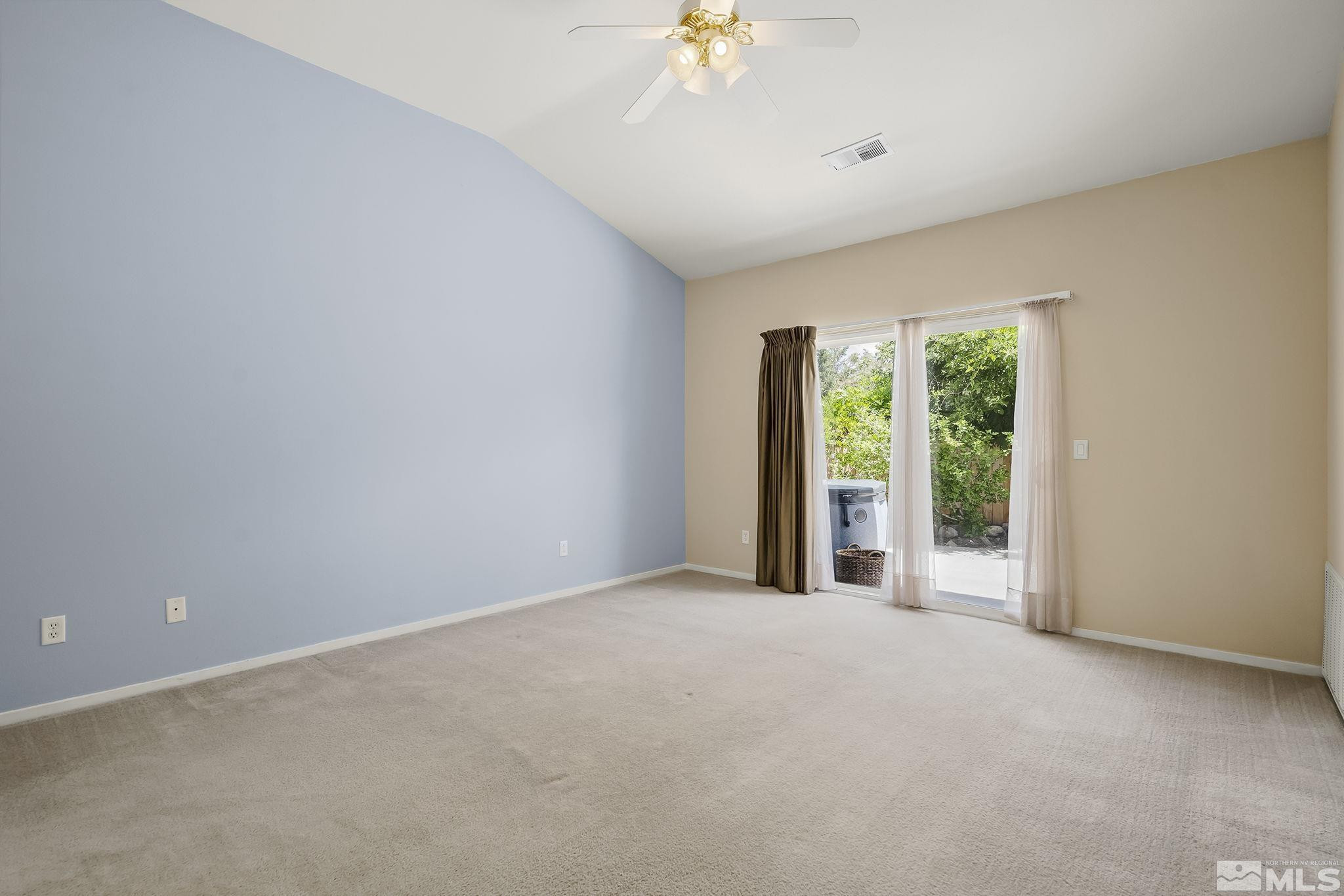 1439 Gaucho Lane Reno, NV 89521 - Photo 15 of 40 a view of an empty room with a window