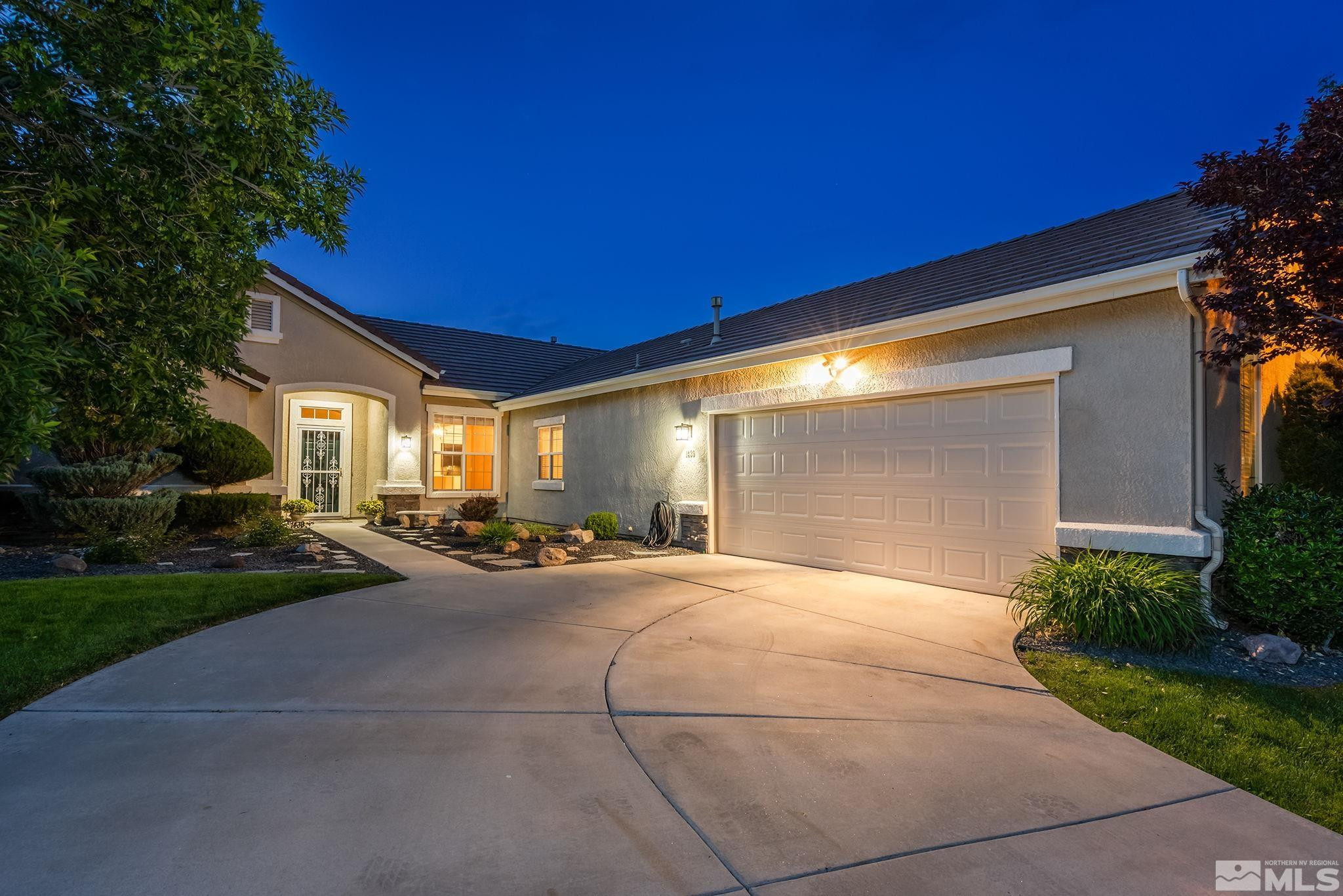 1439 Gaucho Lane Reno, NV 89521 - Photo 3 of 40 a view of a house with outdoor space and a yard