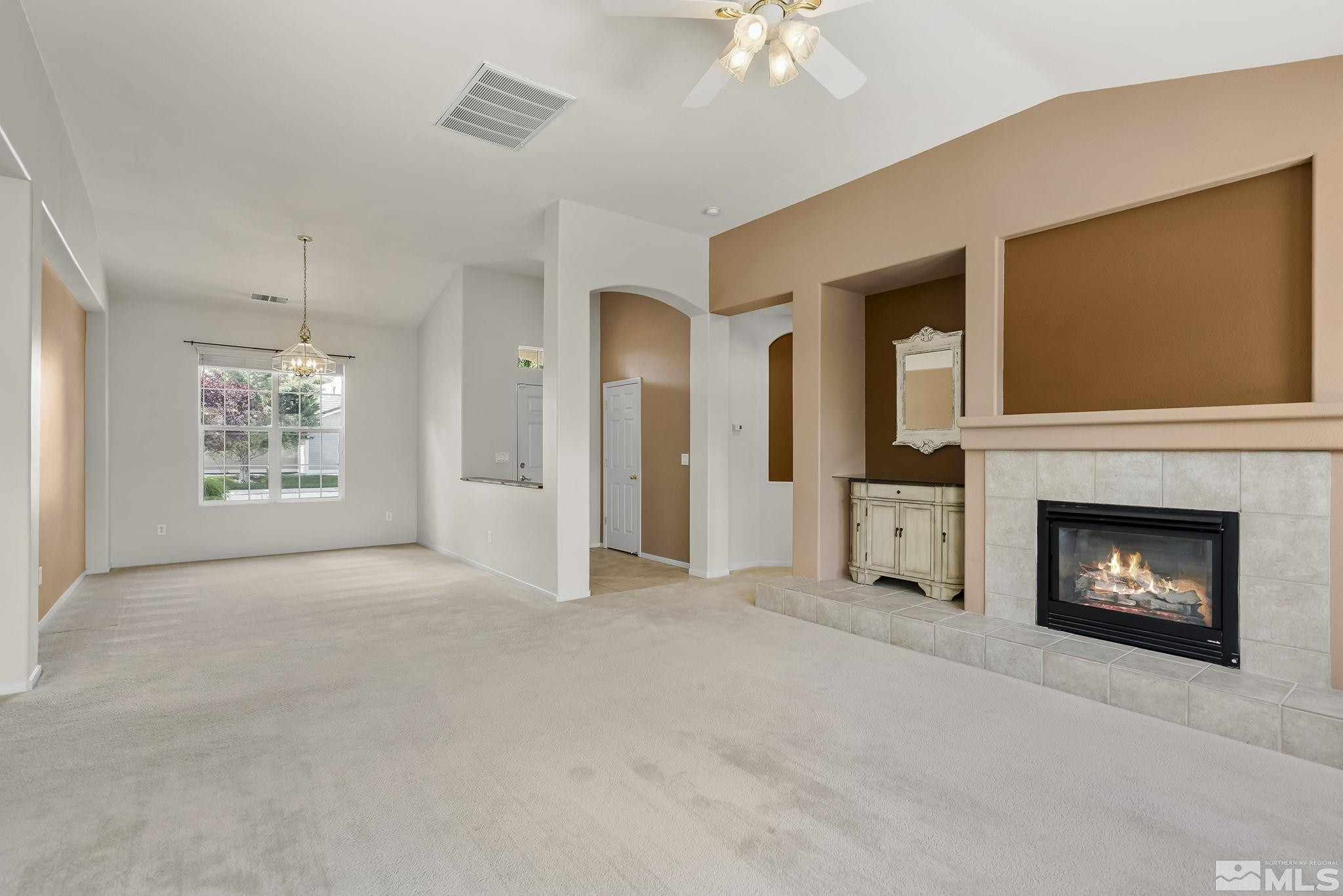 1439 Gaucho Lane Reno, NV 89521 - Photo 8 of 40 a view of a livingroom with a fireplace