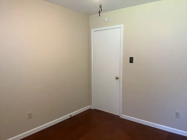 a view of small space with wooden floor