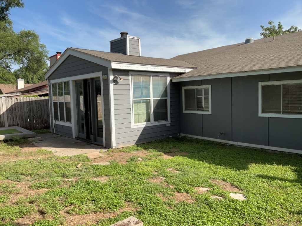 6005 Avery Island Avenue Austin, TX 78727 - Photo 20 of 20 a house view with a garden space