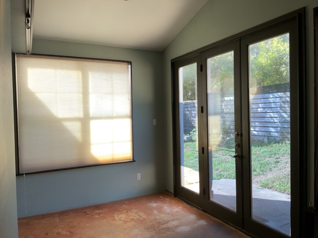 6005 Avery Island Avenue Austin, TX 78727 - Photo 6 of 20 a view of an empty room with a window