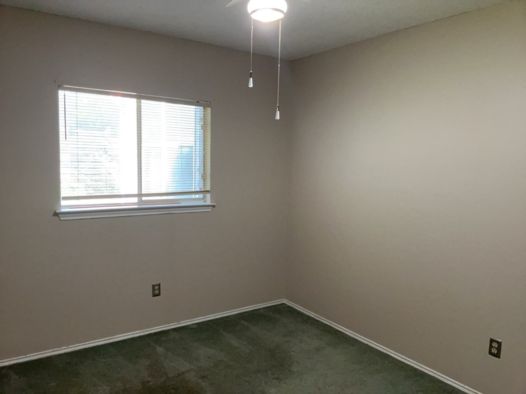 6005 Avery Island Avenue Austin, TX 78727 - Photo 10 of 20 an empty room with a window