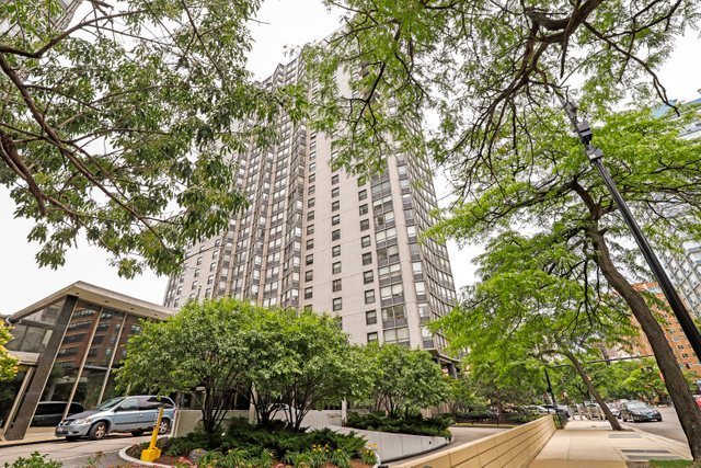 a view of building with yard