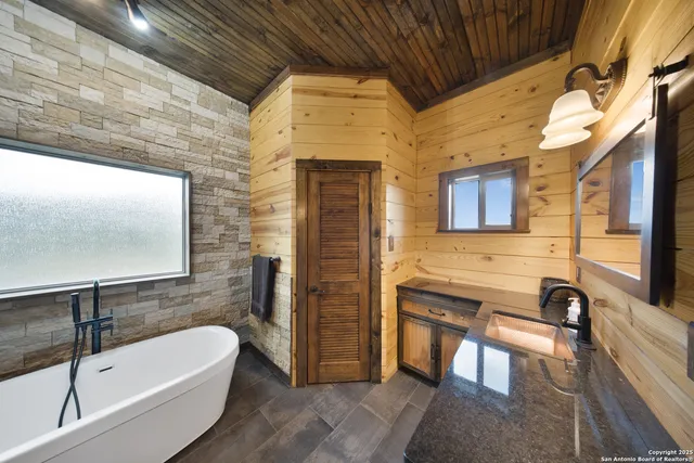 a view of a hallway with windows