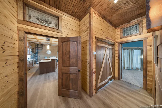 a bathroom with a tub and a shower