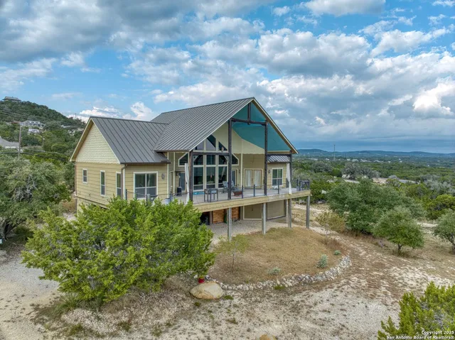 a view of a lake with a house in the background