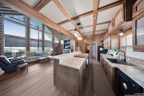 a kitchen with stainless steel appliances granite countertop lots of counter top space