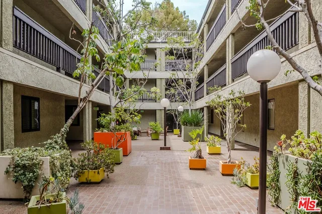 a front view of a building with street view