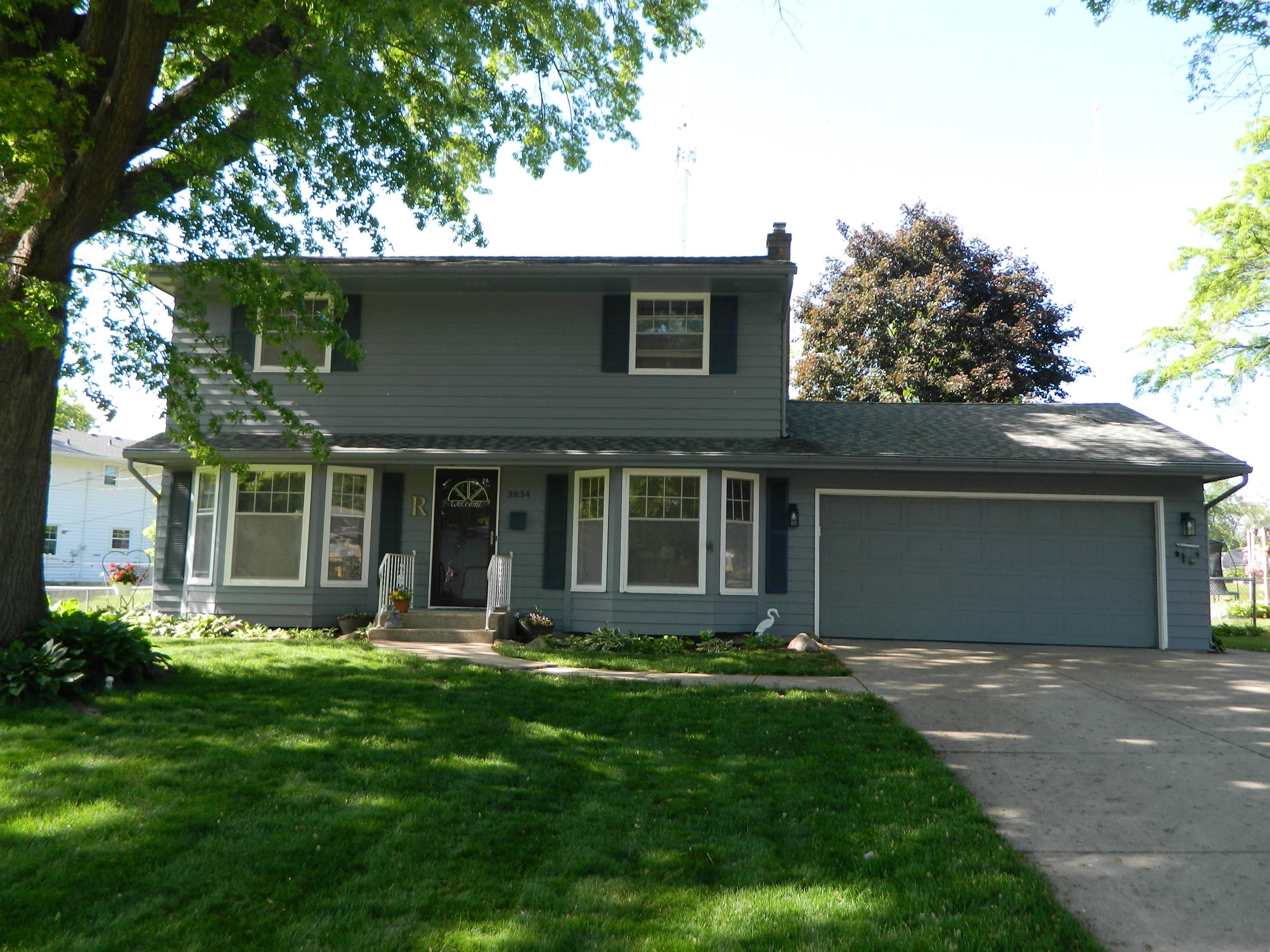 3834 Abbotsford Road Rockford, IL 61107 - Photo 1 of 25 front view of a house with a yard