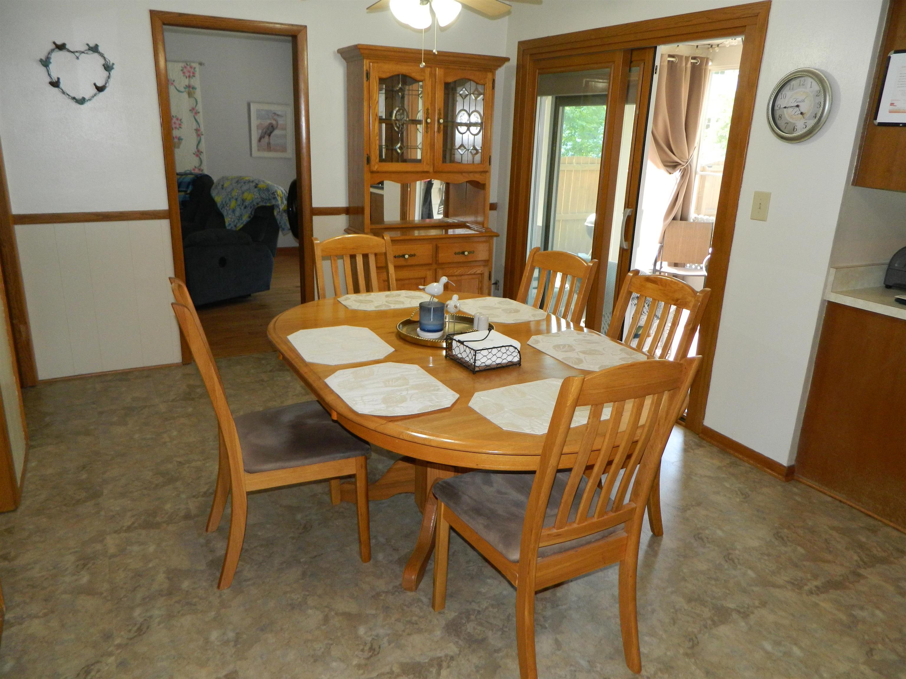3834 Abbotsford Road Rockford, IL 61107 - Photo 9 of 25 a view of a dining room with furniture and wooden floor
