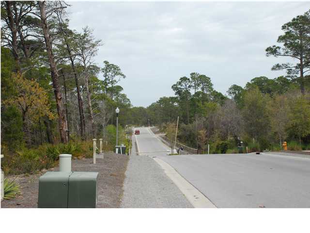 1 Matt's Way Santa Rosa Beach, FL 32459 - Photo 2 of 5 a view of a street with a building in the background