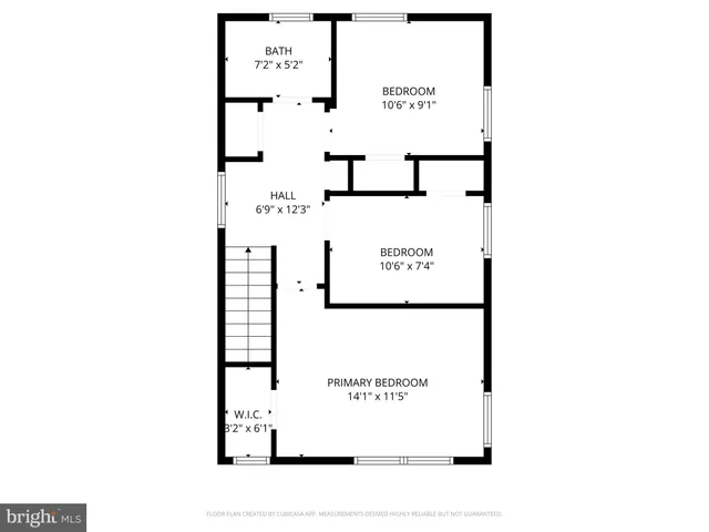 a picture of a bench in front of a wall