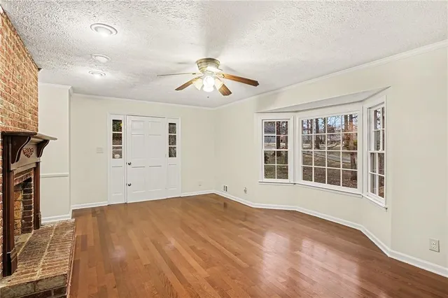 a view of empty room with windows