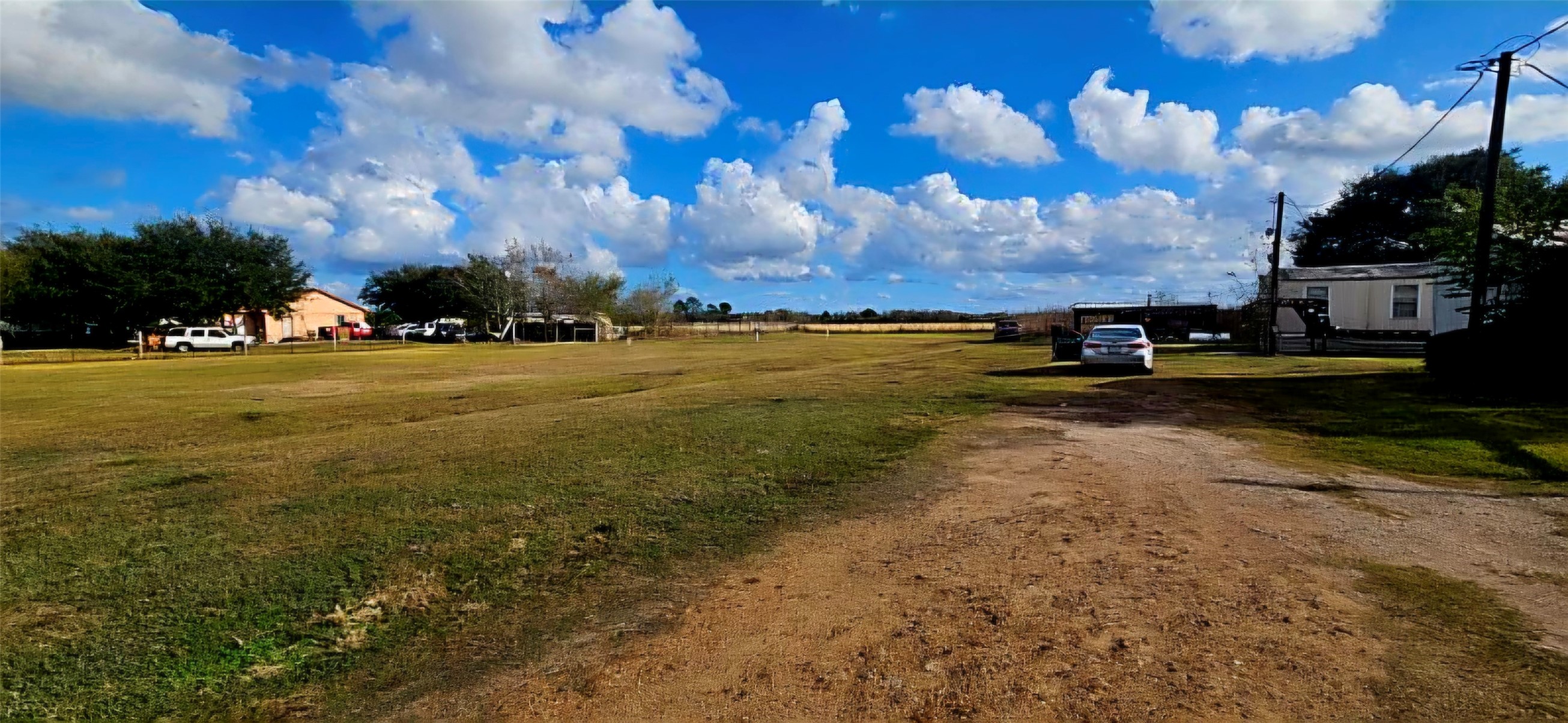 12025 McFarlane Road Beasley, TX 77417 - Photo 2 of 6 a view of a lake with houses