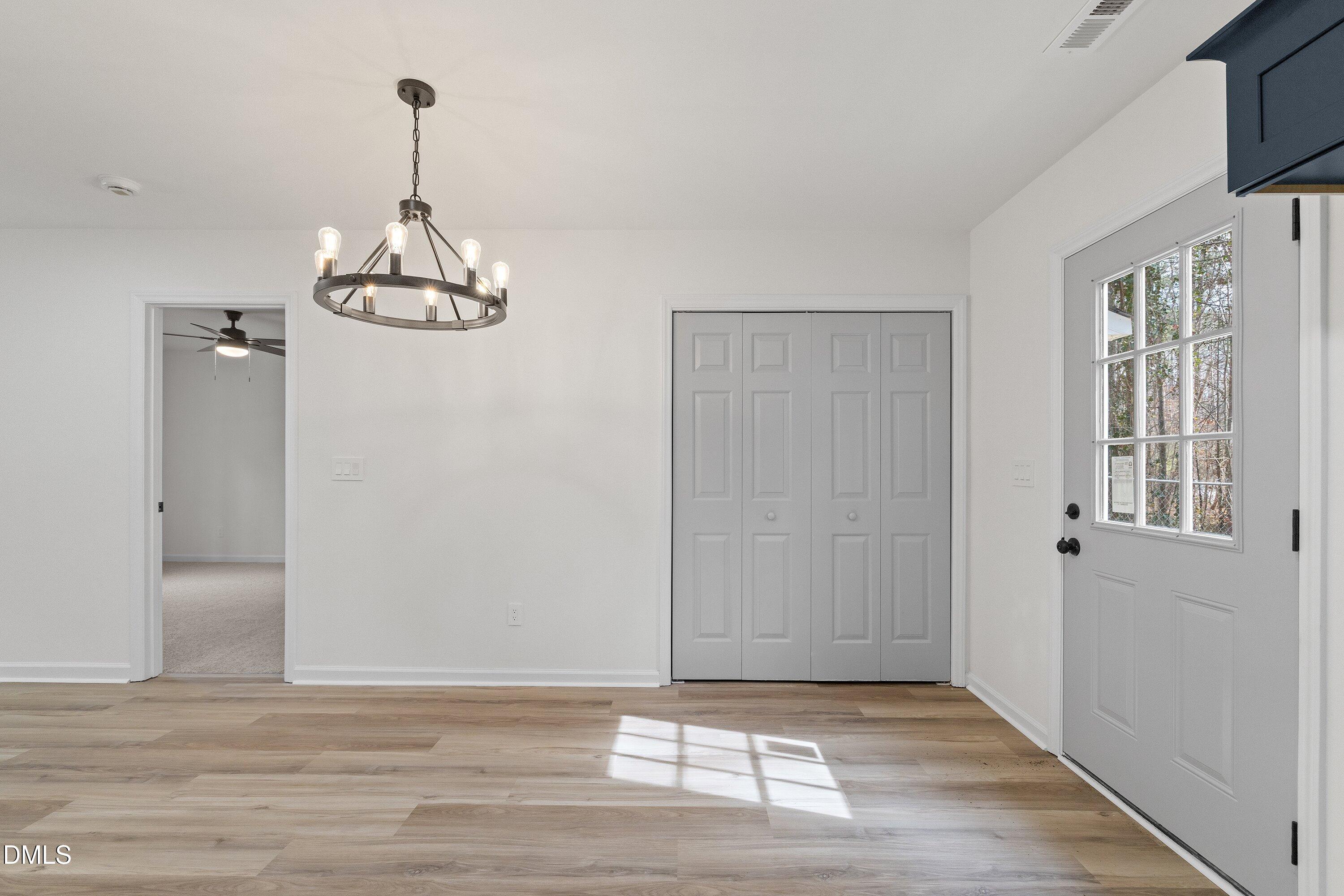 103 Callaway Lane Selma, NC 27576 - Photo 18 of 43 a view of empty room with windows