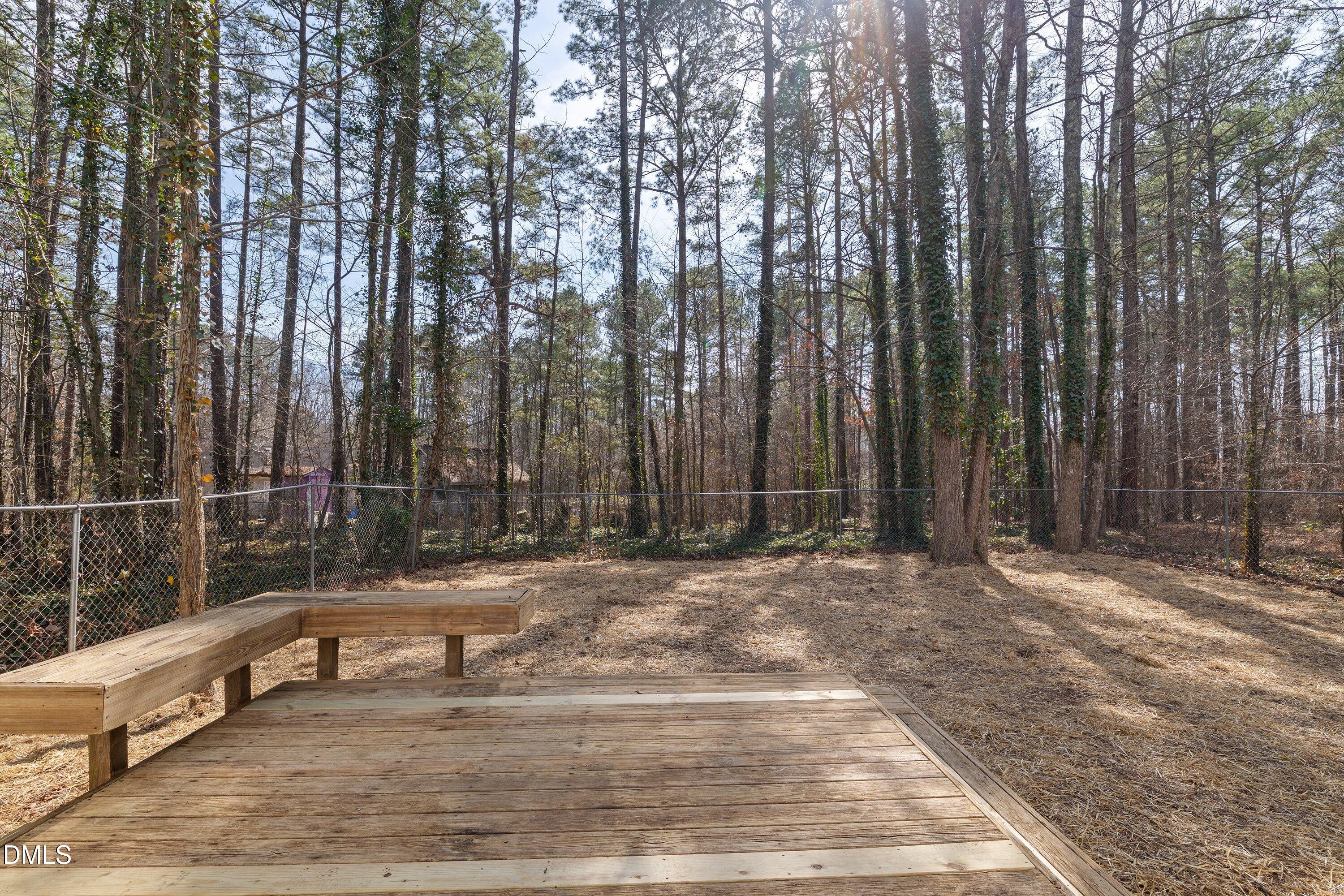 103 Callaway Lane Selma, NC 27576 - Photo 37 of 43 a view of outdoor space with sliding door and tree s