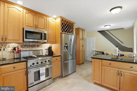 a room with a table and chairs