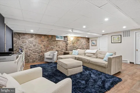 a view of a storage & utility room with a washer dryer