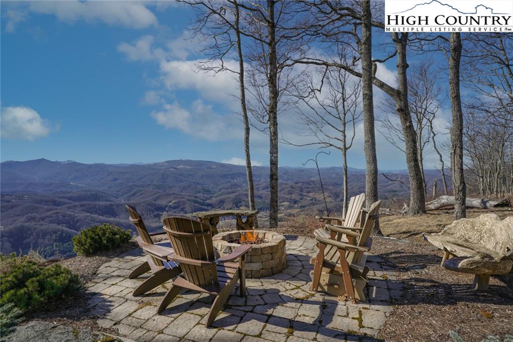 756 Saddle Road Vilas, NC 28692 - Photo 1 of 32 a view of a backyard with sitting area