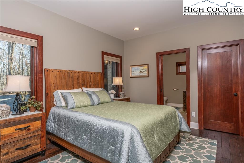 756 Saddle Road Vilas, NC 28692 - Photo 20 of 32 a bedroom with a bed and window