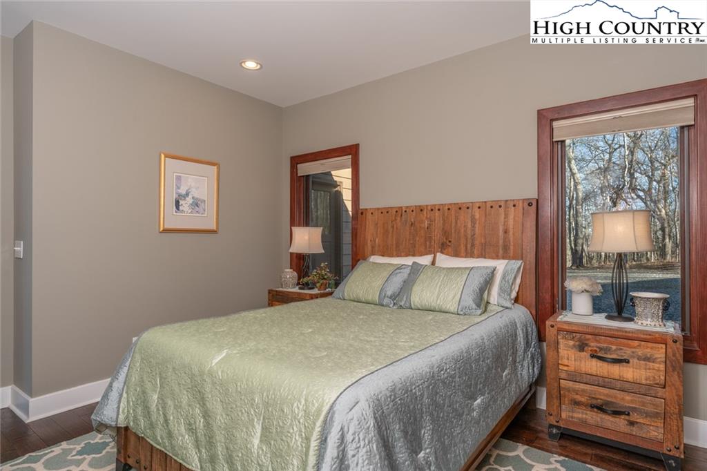 756 Saddle Road Vilas, NC 28692 - Photo 21 of 32 a bedroom with a bed and a window