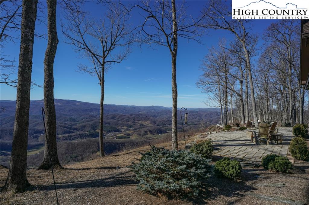 756 Saddle Road Vilas, NC 28692 - Photo 23 of 32 a view of a street with a tree