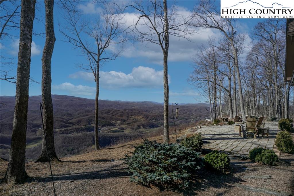 756 Saddle Road Vilas, NC 28692 - Photo 26 of 32 a view of a street with a tree