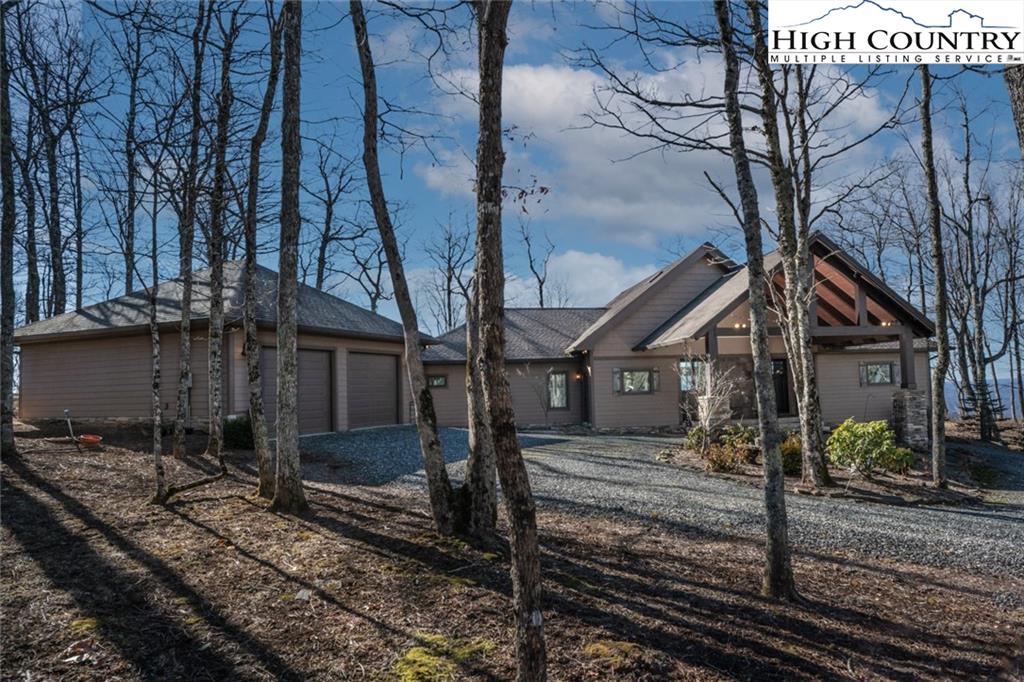 756 Saddle Road Vilas, NC 28692 - Photo 3 of 32 a front view of a house