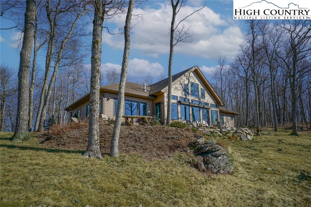 756 Saddle Road Vilas, NC 28692 - Photo 32 of 32 a view of house with a yard