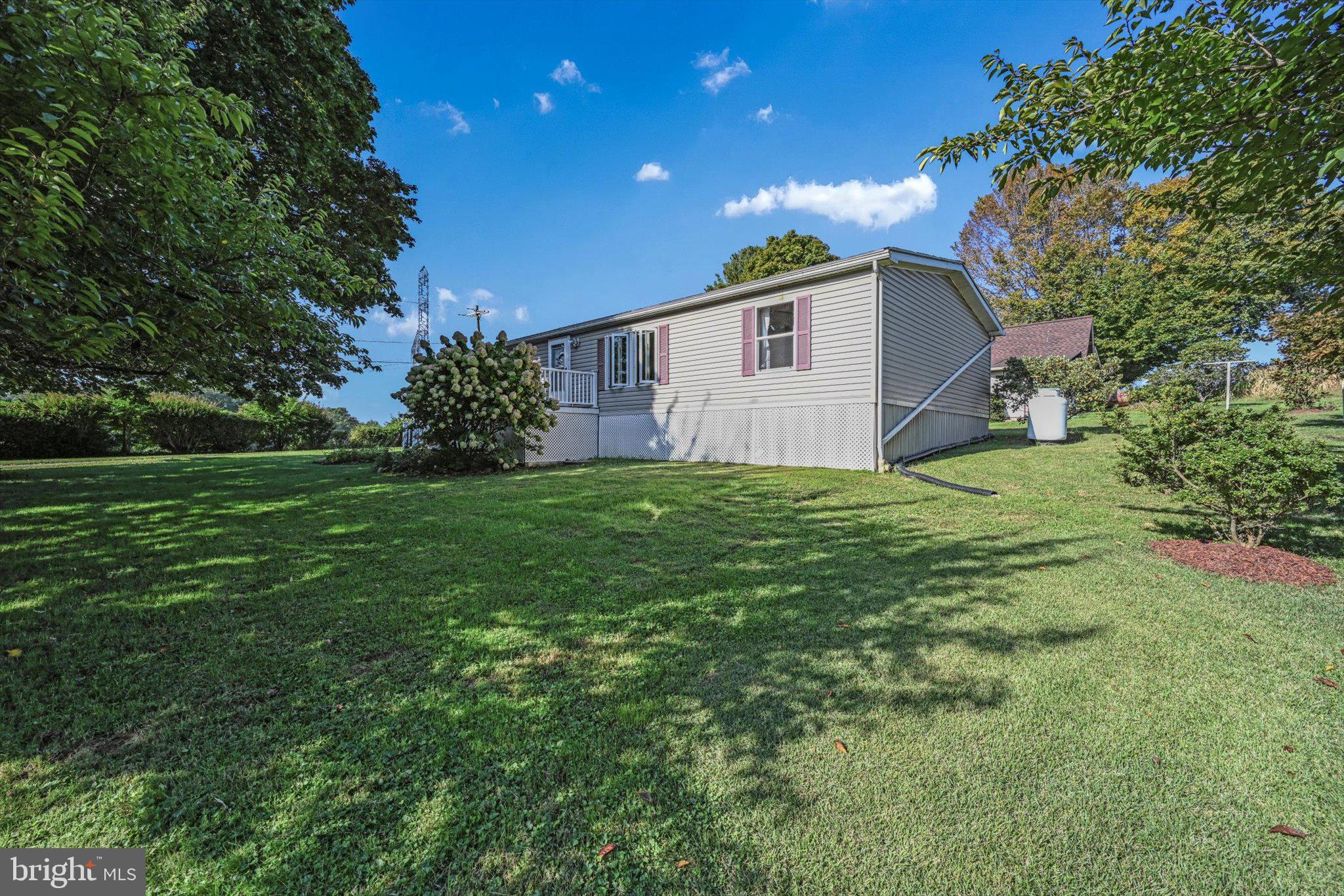 1539 Paper Mill Road Delta, PA 17314 - Photo 2 of 32 Sitting on just over 1 acre of well kept grounds