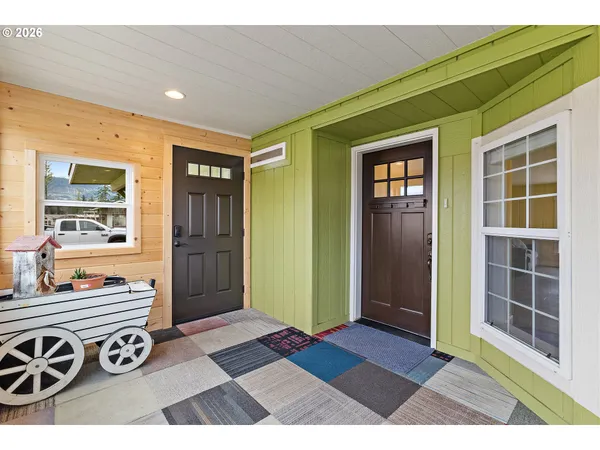a view of front door with furniture
