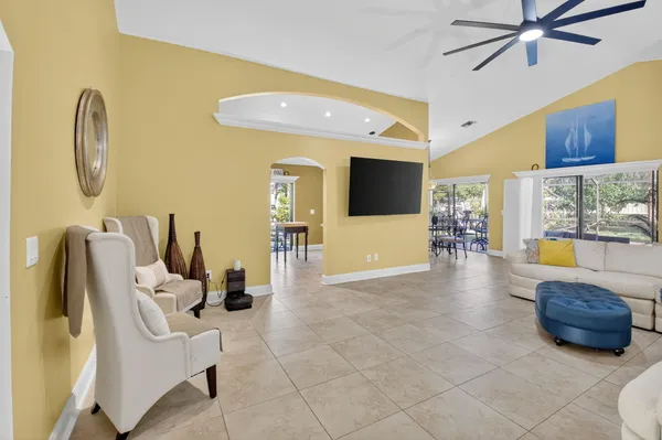 a view of a dining room with furniture window and outside view