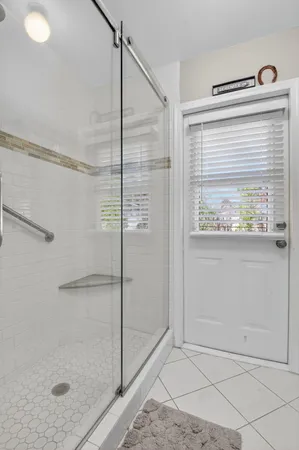 a view of a backyard with swimming pool