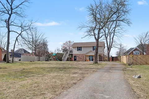 a house view with a outdoor space