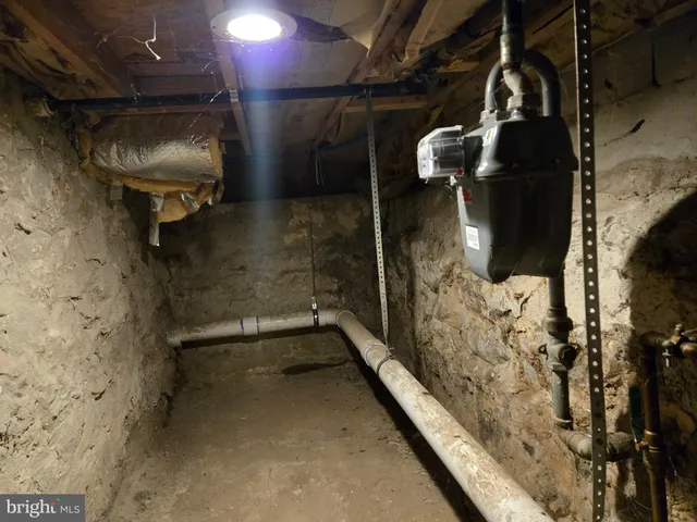 a room with furniture and wooden floor