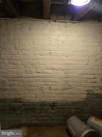 a room with a couch and a window