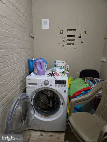 a view of small space in front of house