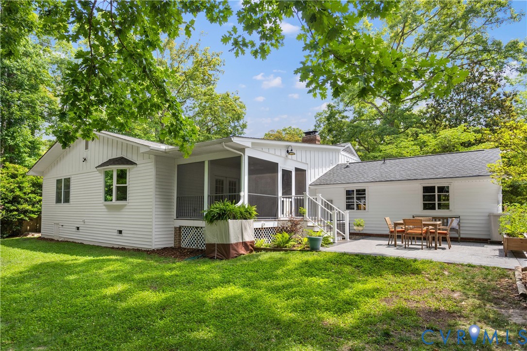 3136 Old Quarry Road Richmond, VA 23225 - Photo 19 of 39 Expansive backyard featuring a manicured lawn