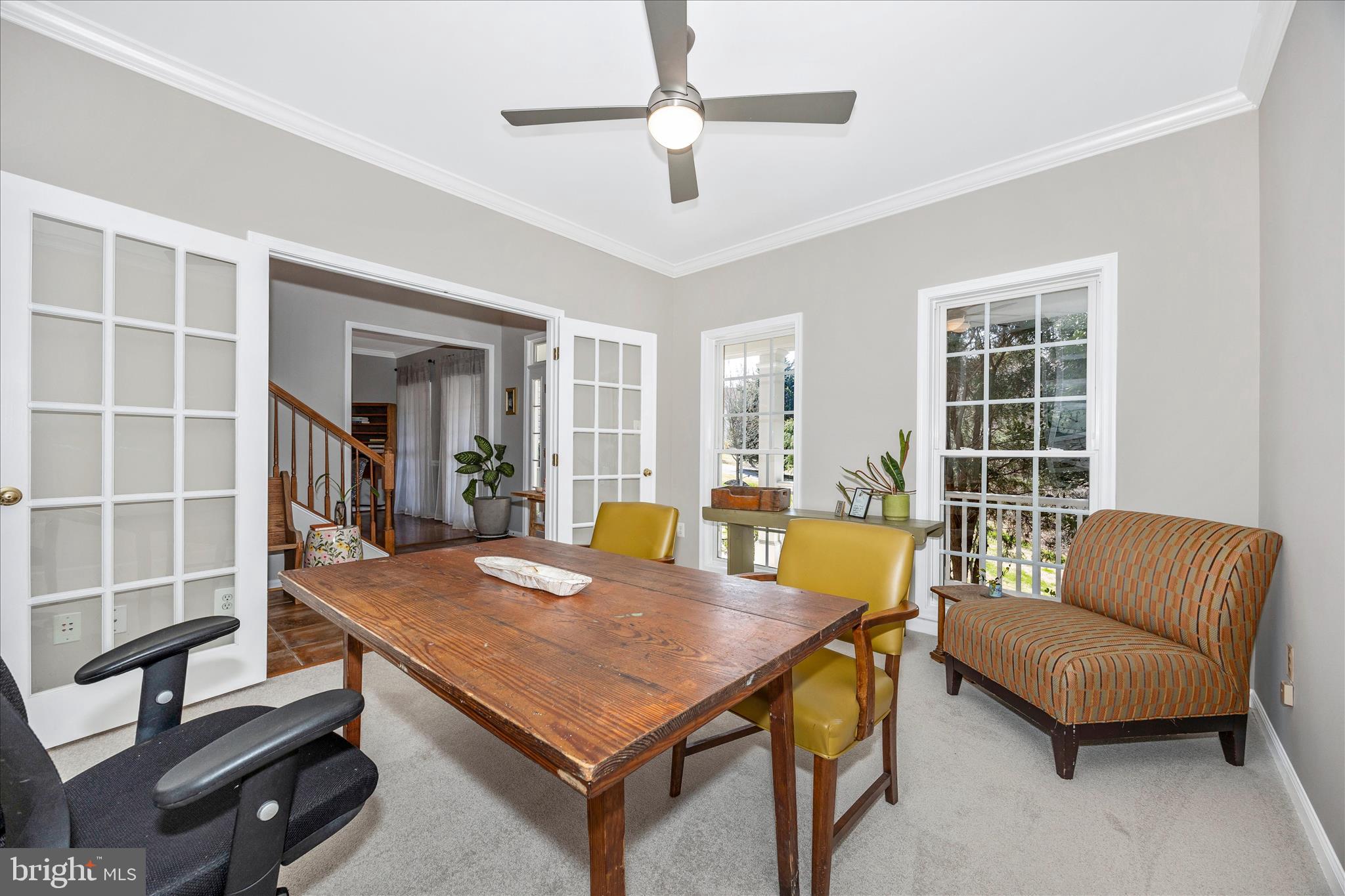 6243 Woodville Road Mount Airy, MD 21771 - Photo 13 of 50 a living room with furniture and a window